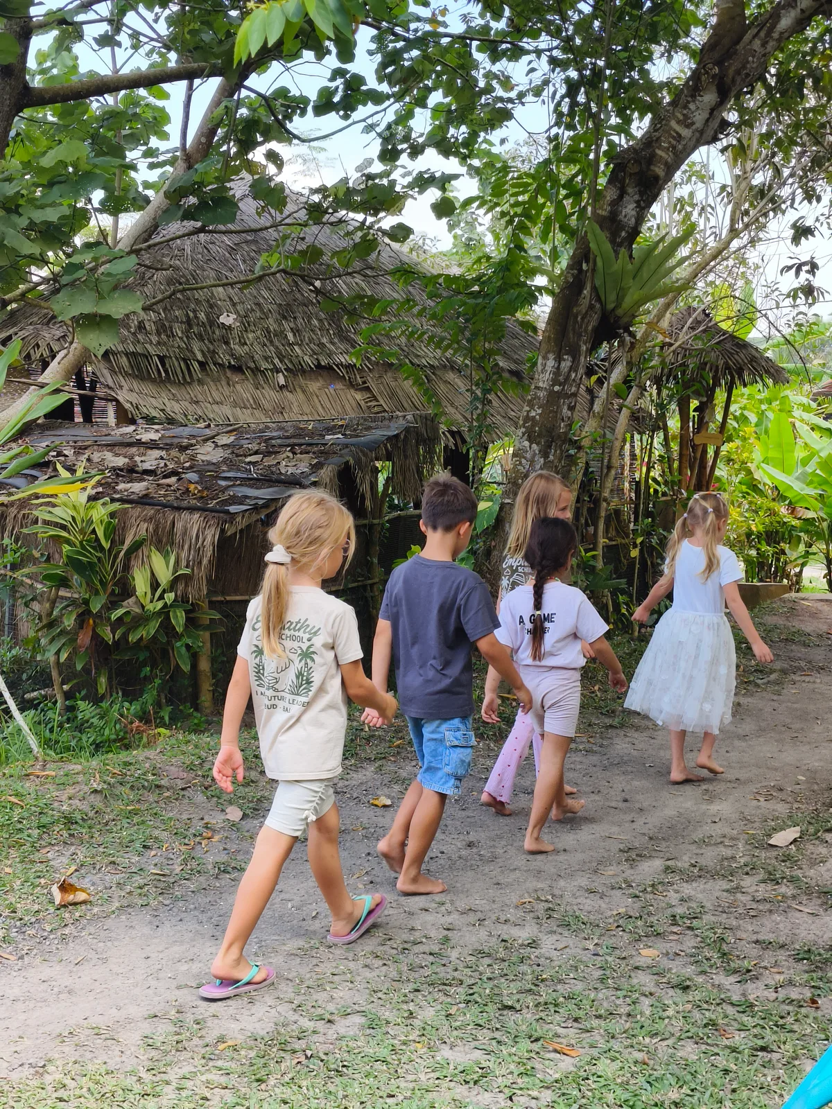 Children exploring the garden at Empathy School Bali
