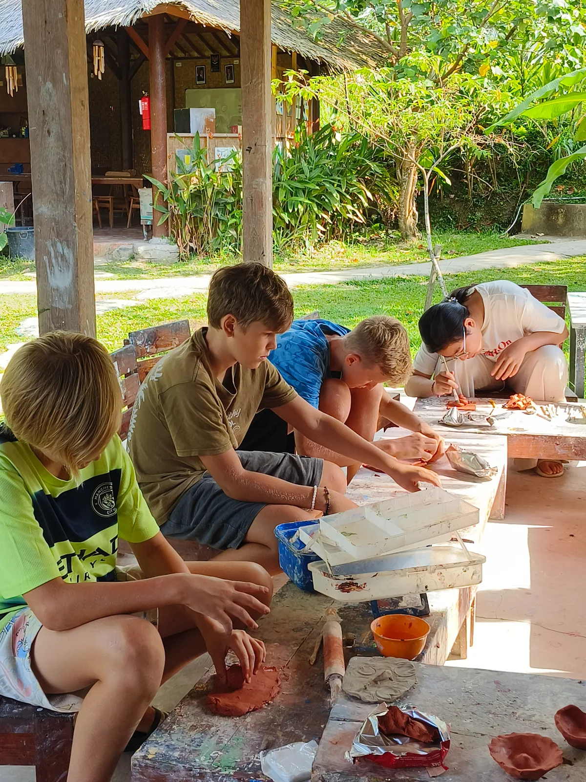 Students working together on a project at Empathy School Bali
